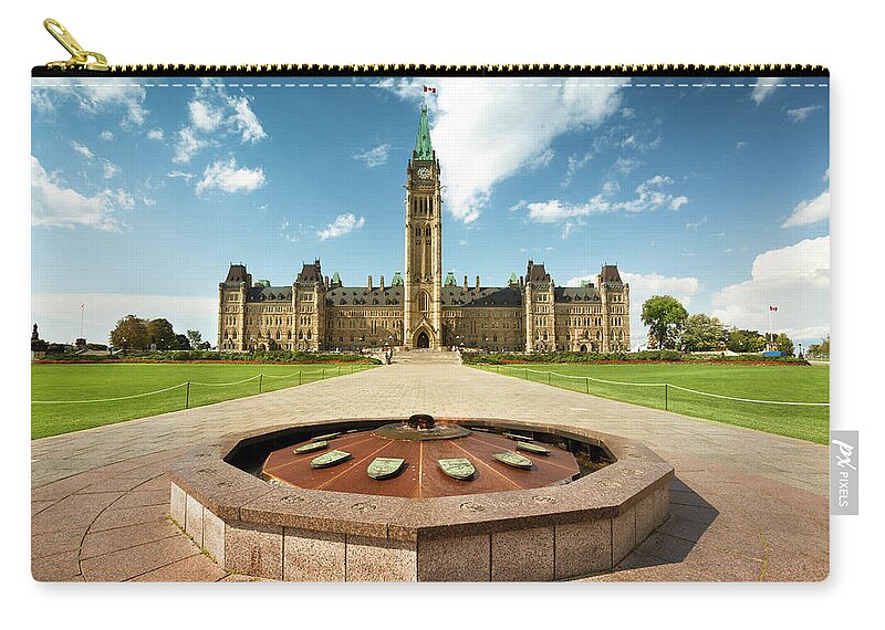 Built Structure Zip Pouch featuring the photograph Parliament Hill In Ottawa by Pgiam
