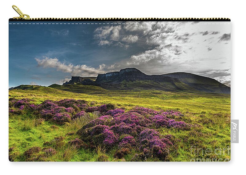 Abandoned Zip Pouch featuring the photograph Pasture With Blooming Heather In Scenic Mountain Landscape At The Old Man Of Storr Formation On The by Andreas Berthold