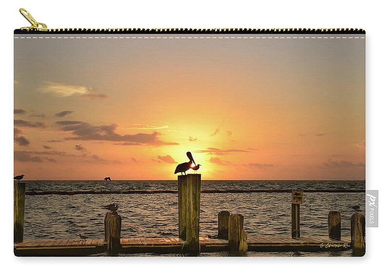  Zip Pouch featuring the photograph Pelican Sunrise by Christopher Rice