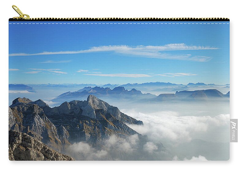 Scenics Zip Pouch featuring the photograph Picture Of A Mountain Top From Above by Kieselundstein