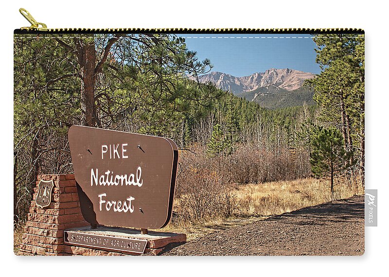 Pike National Forest Zip Pouch featuring the photograph Pike National Forest by Kristia Adams