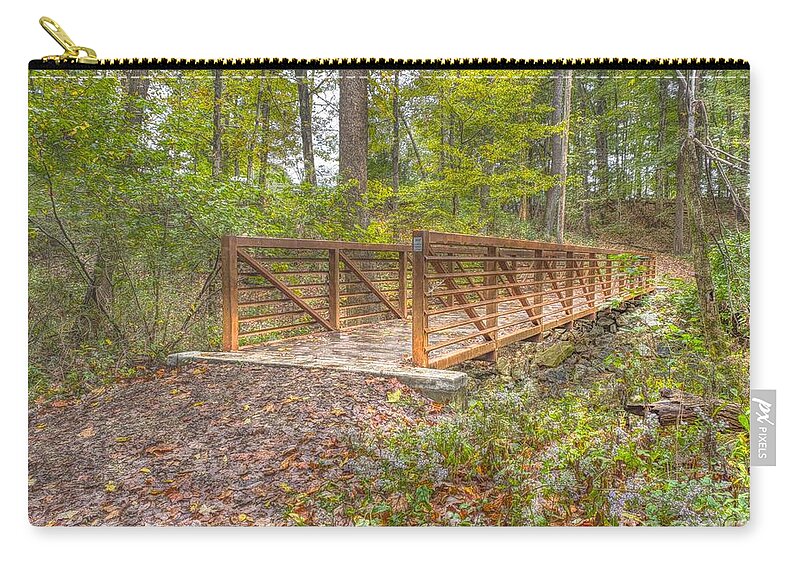Nature Zip Pouch featuring the photograph Pine Quarry Park Bridge by Jeremy Lankford