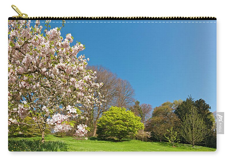 Scenics Zip Pouch featuring the photograph Pink Blossom Blooming Lush Green Spring by Fotovoyager