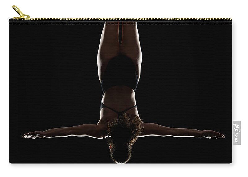 People Zip Pouch featuring the photograph Platform High Diver Pre-entry Cruciform by Lewis Mulatero