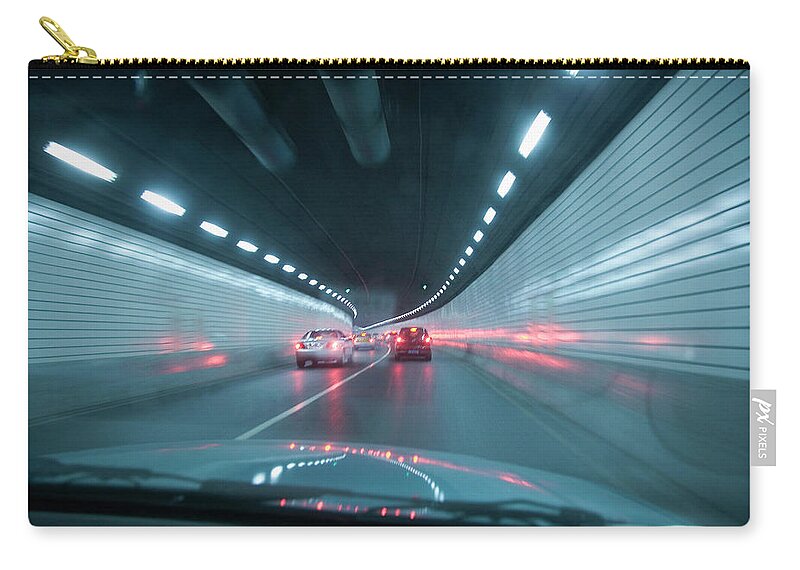 Car Interior Zip Pouch featuring the photograph Point Of View Out Front Of Car In Tunnel by Grant Faint
