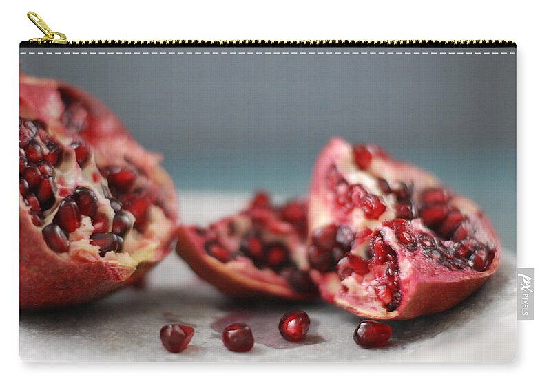 Pomegranate Zip Pouch featuring the photograph Pomegranates by Shawna Lemay