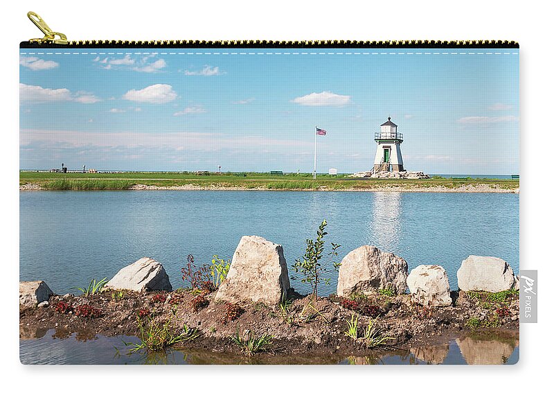 Port Clinton Lighthouse Zip Pouch featuring the photograph Port Clinton Lighthouse and Pond by Marianne Campolongo