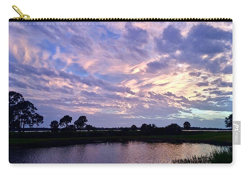 Sunset Zip Pouch featuring the photograph Purple Skies Over Water by Kathy Chism