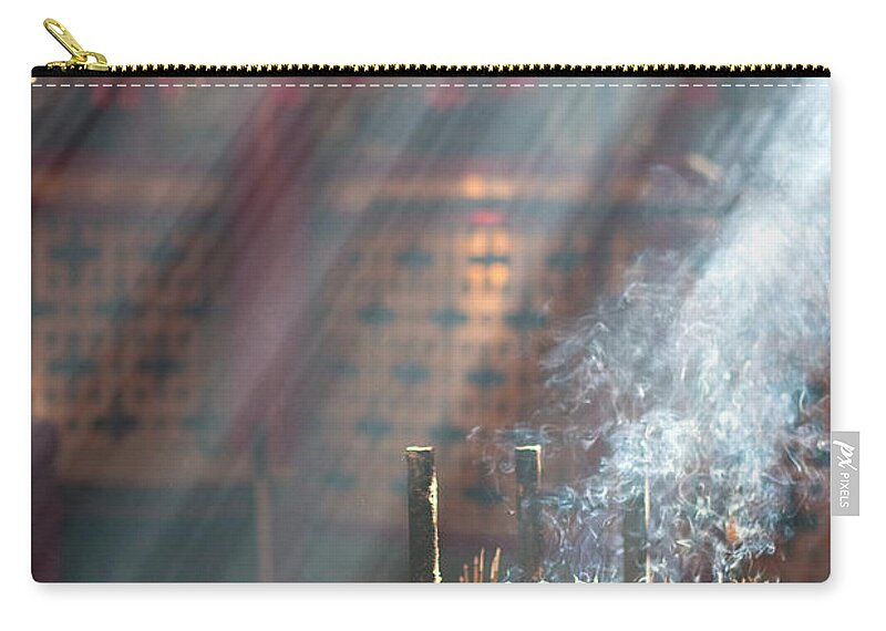 Chinese Culture Zip Pouch featuring the photograph Rays Of Light Through Incense Coils by Sirintira Maneesri