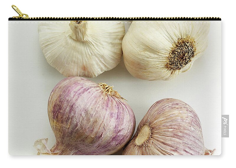 White Background Zip Pouch featuring the photograph Red And White Garlic by David Bishop Inc.