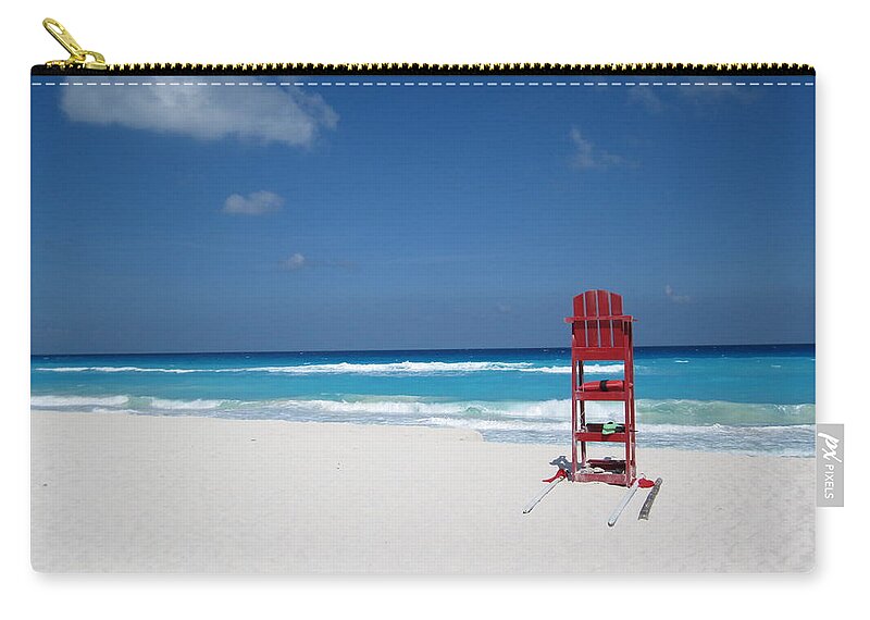 Shadow Zip Pouch featuring the photograph Red Chair On A Beach In Cancun by Ben Beiske