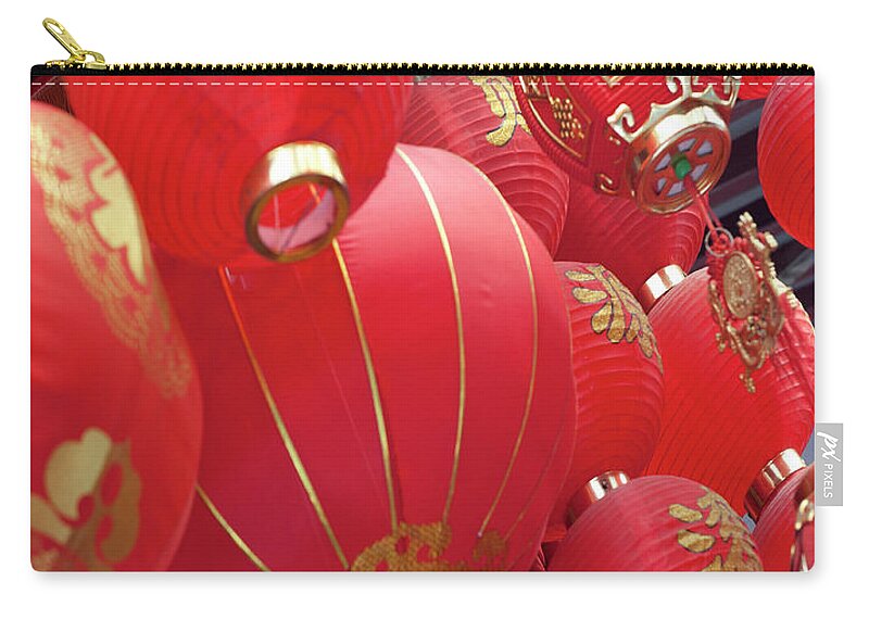 Chinese Culture Zip Pouch featuring the photograph Red Chinese Lanterns For Sale In A by Shanna Baker