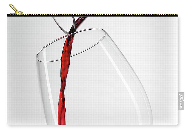 White Background Zip Pouch featuring the photograph Red Wine Pouring Into Glass From by Roger Méndez Fotografo, S.l.
