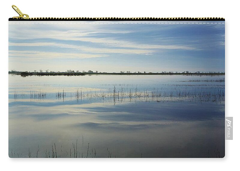 Landscape Zip Pouch featuring the photograph Reflected Sky by Brett Harvey