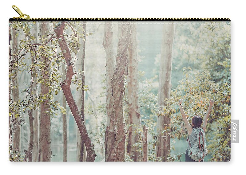 Three Quarter Length Zip Pouch featuring the photograph Relaxing In Nature By Stretching And by D3sign