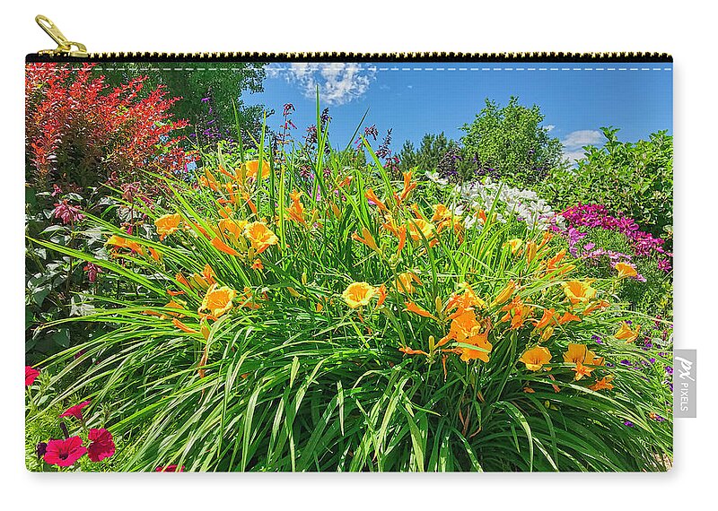 Garden Zip Pouch featuring the photograph Riot Of Color by Lorraine Baum