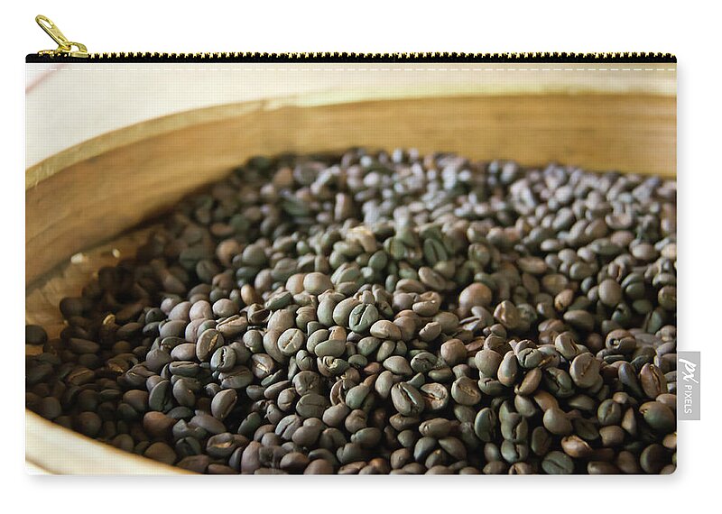 Heap Zip Pouch featuring the photograph Roasted Coffee Beans At Coffee by Melissa Tse