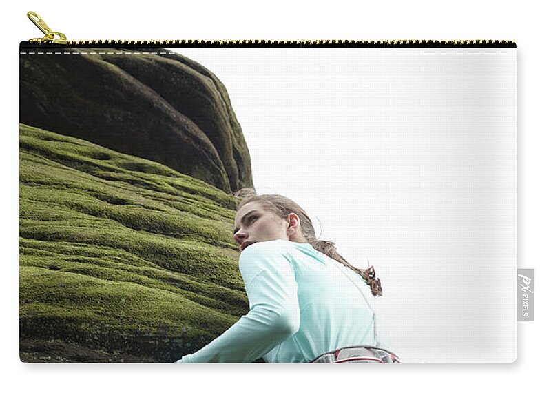 Human Arm Zip Pouch featuring the photograph Rock Climber Scaling Boulder by Tim Hall