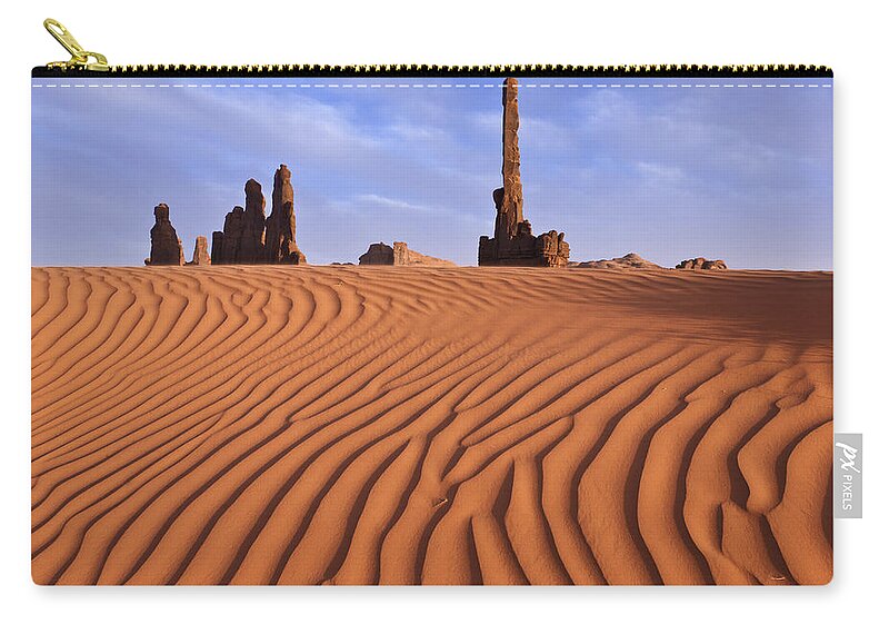 Scenics Zip Pouch featuring the photograph Rock Formations In Monument Valley by Jeremy Woodhouse