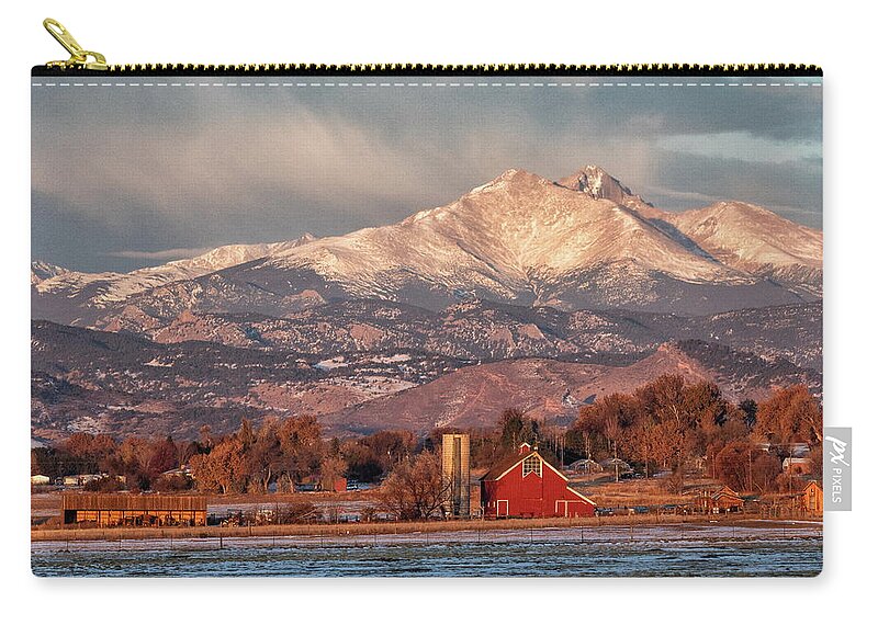 Farm Zip Pouch featuring the photograph Rocky Mountains Tower Over a Farm by Tony Hake