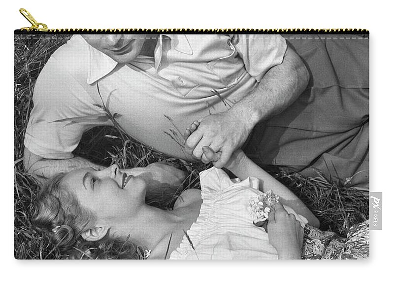 Grass Family Zip Pouch featuring the photograph Romantic Couple In Meadow by George Marks