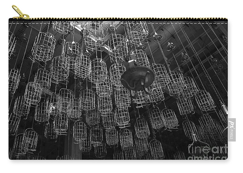 Hanging Zip Pouch featuring the photograph Room Full Of Baskets Hanging From by Andreas Chronz