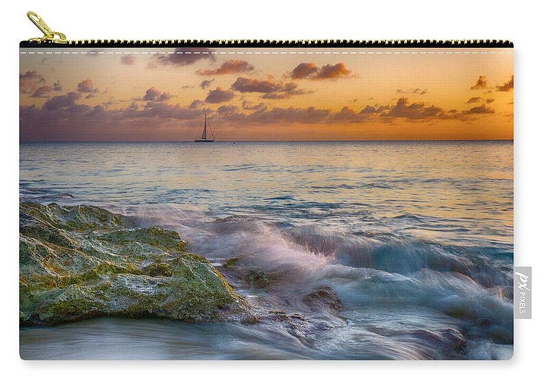 Pristine Zip Pouch featuring the photograph Sailboat in the Sunset at Rainbow Beach by Amanda Jones