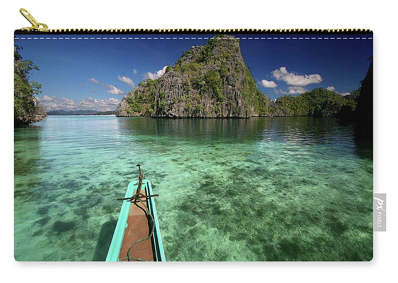 Tranquility Zip Pouch featuring the photograph Sailing Over Coral Coron by Photo ©tan Yilmaz