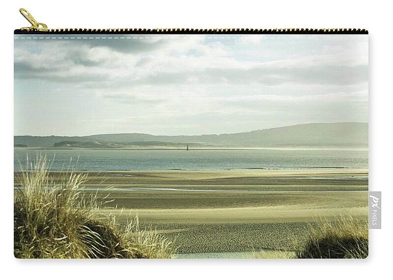 Sand Dune Zip Pouch featuring the photograph Sand Dunes With Empty Beach And by Tirc83