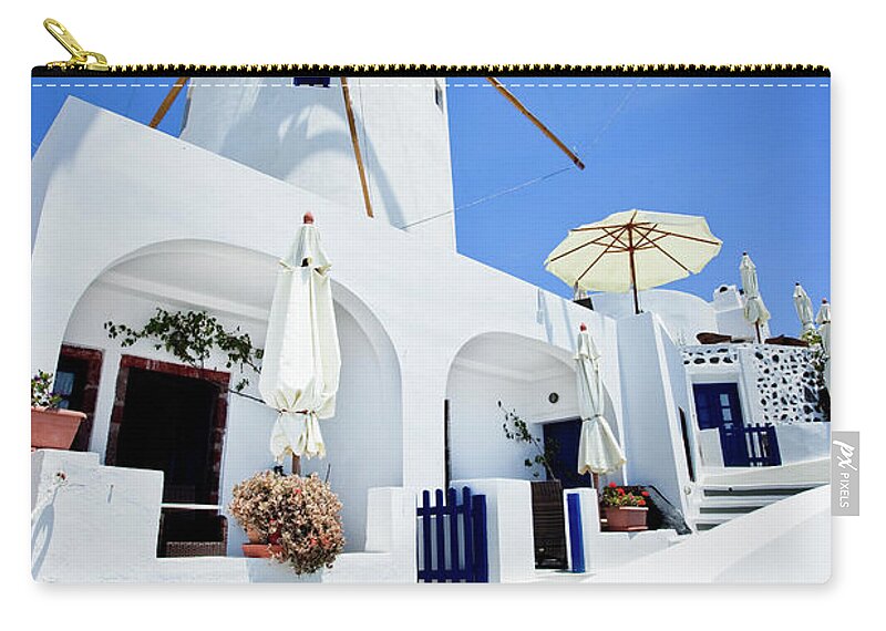 Curve Zip Pouch featuring the photograph Santorini Idyllic Hotel In Oia by Mbbirdy