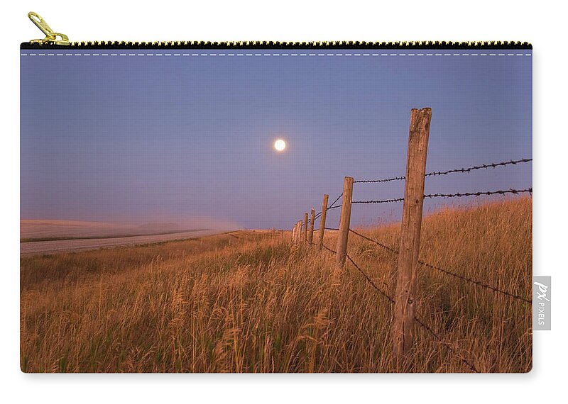 Tranquility Zip Pouch featuring the photograph September 15, 2008 - Harvest Moon Down by Alan Dyer/stocktrek Images