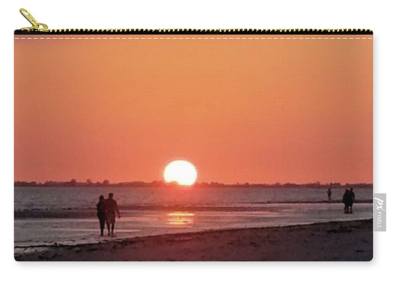 Sunset Zip Pouch featuring the photograph Setting Sun at the Beach by Karen Stansberry