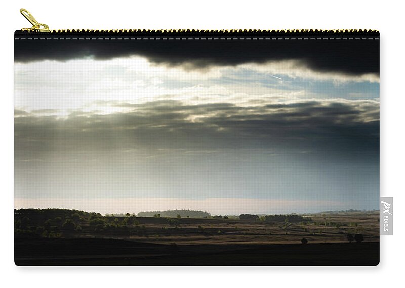 Baslow Zip Pouch featuring the photograph Shining through at Baslow Edge by Scott Lyons