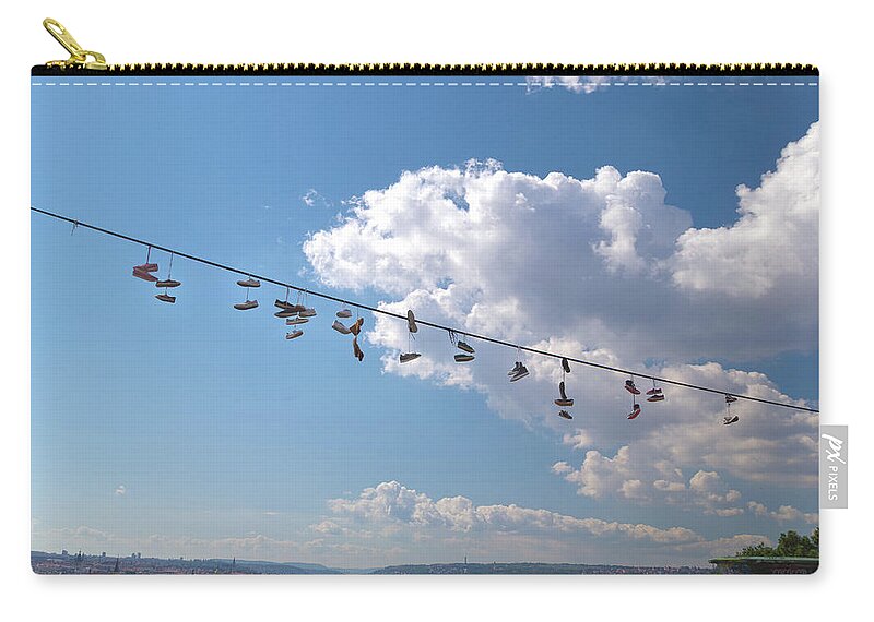 River Zip Pouch featuring the photograph Shoes hanging over Prague by Vivida Photo PC