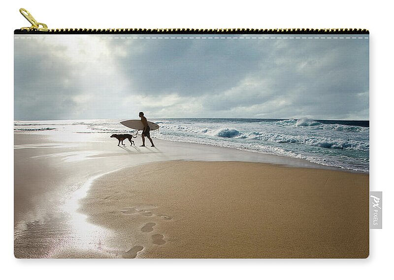 Pets Zip Pouch featuring the photograph Silhouette Of Surfer With Dog Walking by Ed Freeman