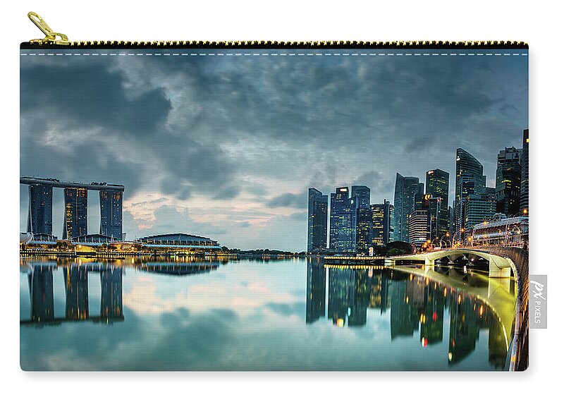 Chriscousins Zip Pouch featuring the photograph Singapore Lighst by Chris Cousins