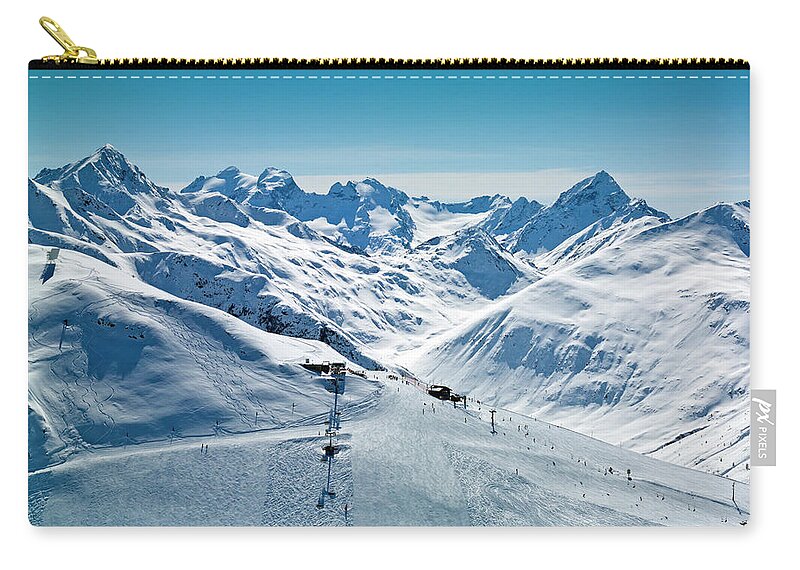 Scenics Zip Pouch featuring the photograph Ski Resort In Mountains by Creativaimage
