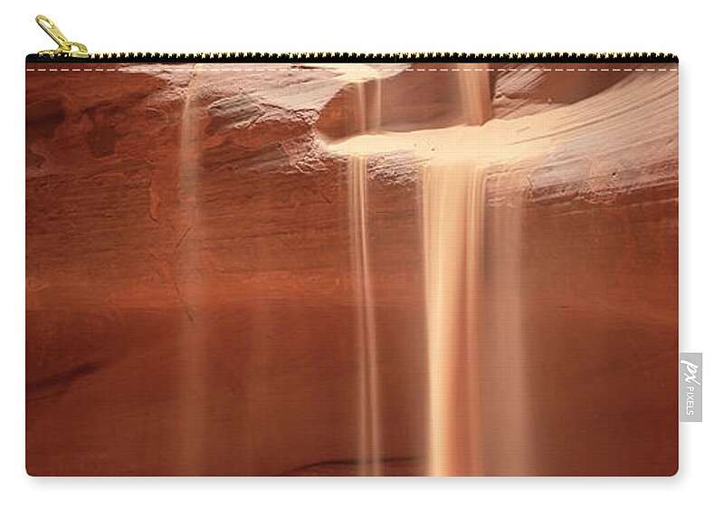 Sandstone Zip Pouch featuring the photograph Slipping Away by Laura Hedien