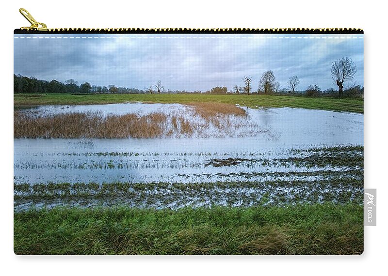 Field Zip Pouch featuring the photograph Smell of the Earth 2 by Jaroslav Buna