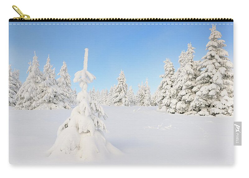 Snow Zip Pouch featuring the photograph Snow Covered Fir Trees by Cornelia Doerr