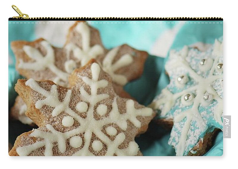 Artificial Zip Pouch featuring the photograph Snowflake Gingerbread Cookies by Lucytxcicipeng