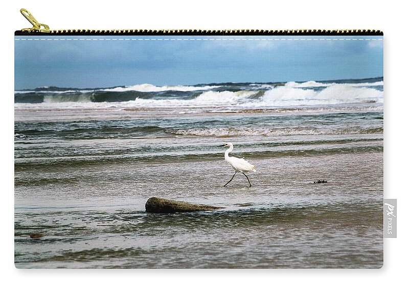 Snowy Egret Zip Pouch featuring the photograph Snowy Egret Braving the Surf by Mary Ann Artz