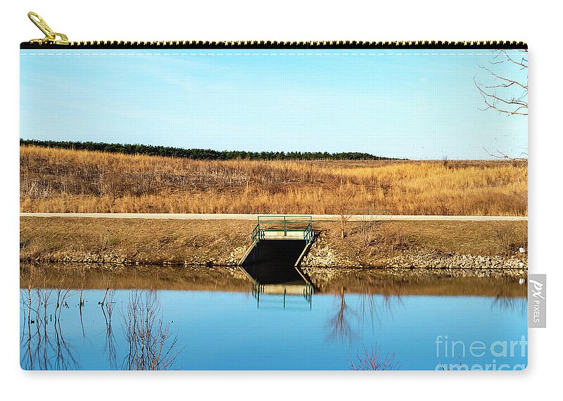 Lake Zip Pouch featuring the photograph Spill Way into Lake by Sandra J's