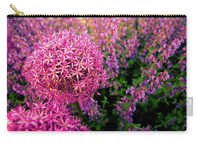 Purple Zip Pouch featuring the photograph Spring Flowers In Garden by Flash Parker