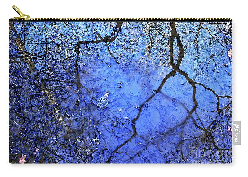 Water Zip Pouch featuring the photograph Spring Puddle Abstract by Mike Eingle
