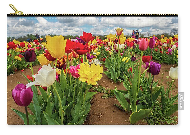 Spring Flowers Zip Pouch featuring the photograph Spring Tulips by Louis Dallara