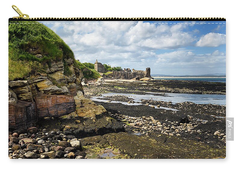 St Andrews Castle Zip Pouch featuring the photograph St Andrews Castle ruins with wall to rocky ocean with tide pools by Reimar Gaertner