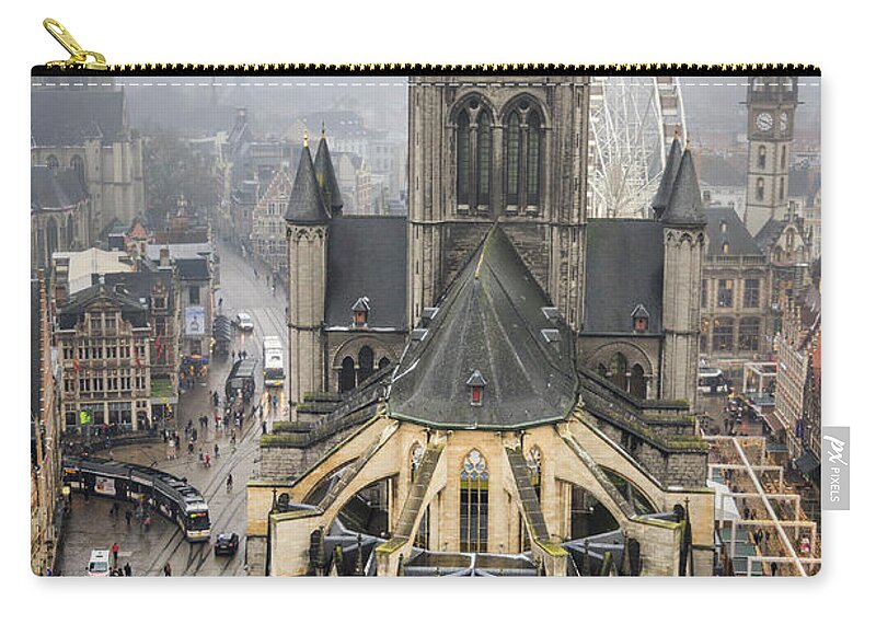 Nicholas Zip Pouch featuring the photograph St. Nicholas Church, Ghent. by Pablo Lopez
