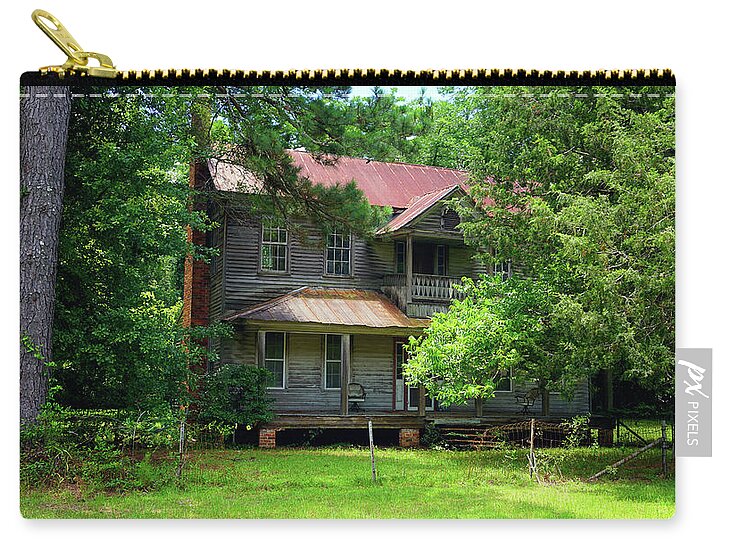 Historic Zip Pouch featuring the photograph Standing Proud by Kelly Gomez