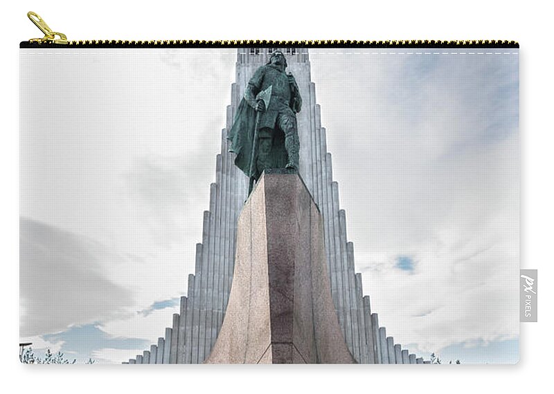 Iceland Zip Pouch featuring the photograph Statue of explorer Leif Erikson and Hallgrimskirkja in Reykjavik by RicardMN Photography